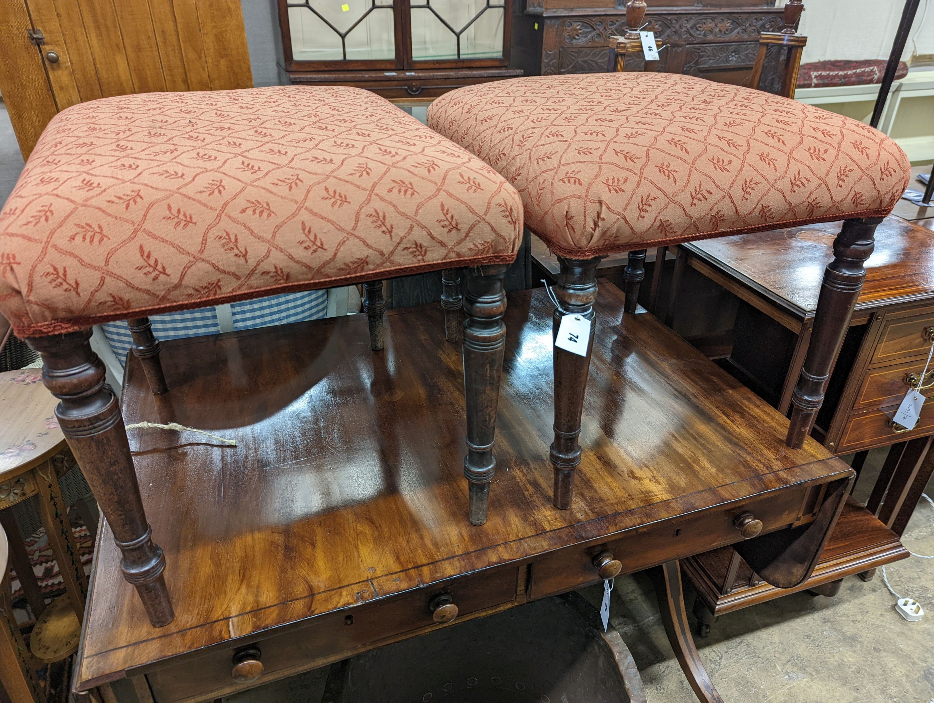 A pair of Regency rectanuglar mahogany upholstered dressing stools, length 50cm, depth 42cm, height 44cm